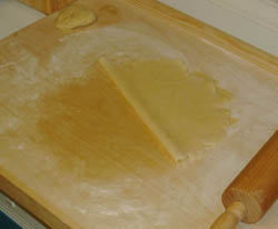 Folding the pie crust dough in half